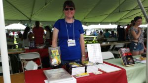 Kerry Gans at her table at BooksNJ